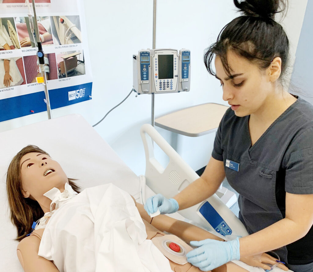 BCIT Nursing Student with TB Vets-Funded Juno manikin