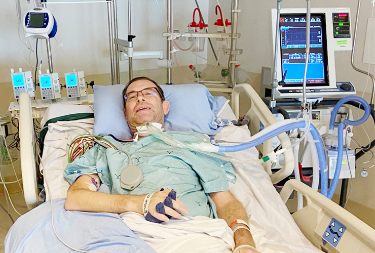 Victoria General Hospital patient Keith with a TB Vets-funded ventilator